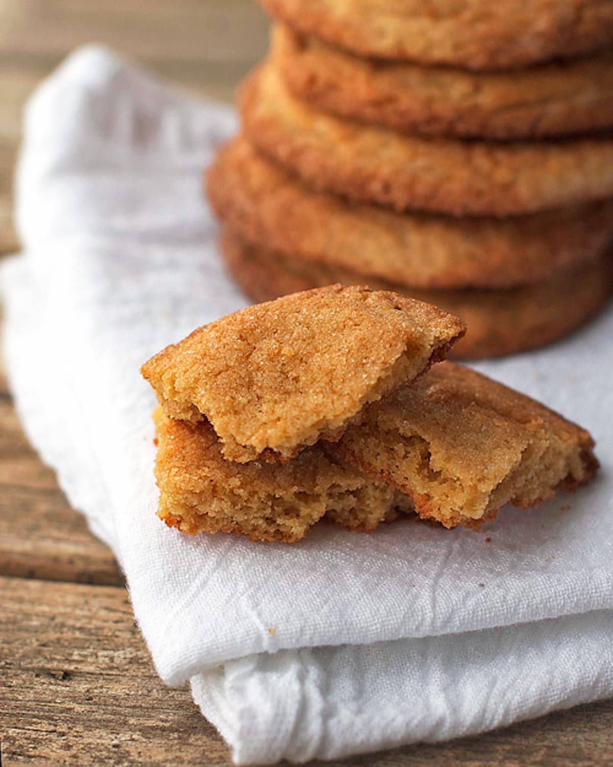 Brown sugar cookies on a white napkin.