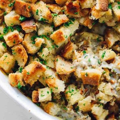 Chicken Wild Rice Casserole in a dish with a spoon.