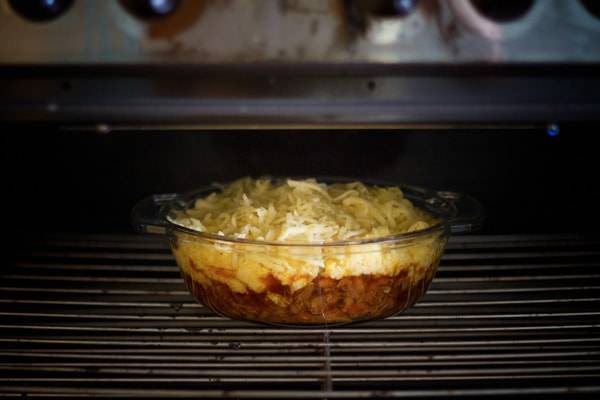 Mexican polenta pie in an oven.