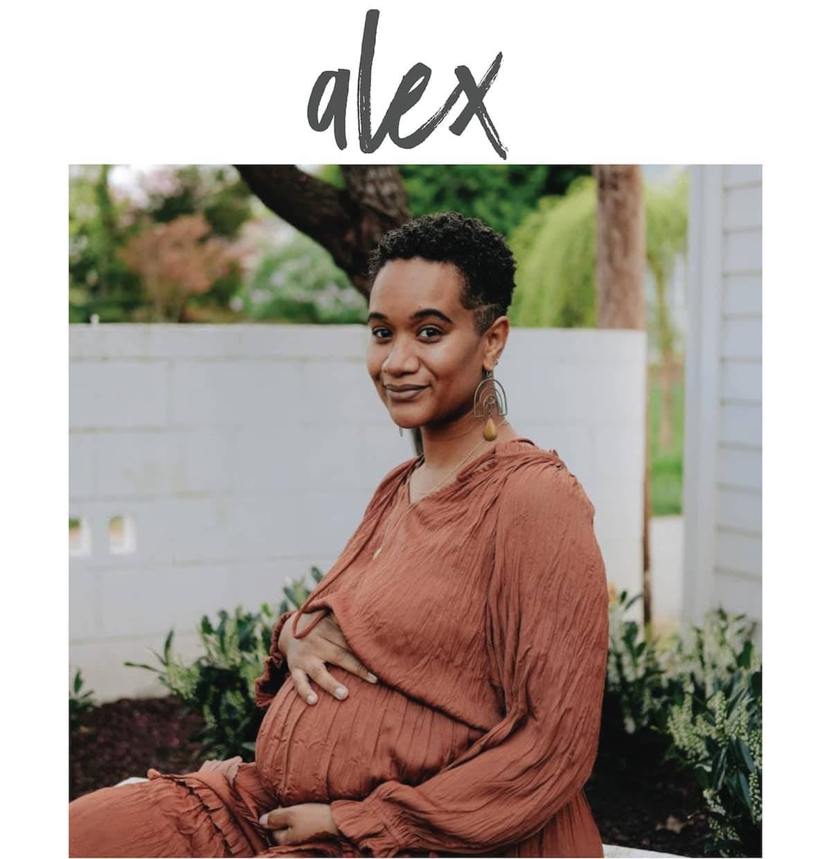 A pregnant woman poses.