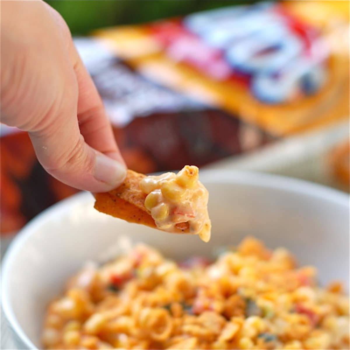 Spicy corn salad on a frito.