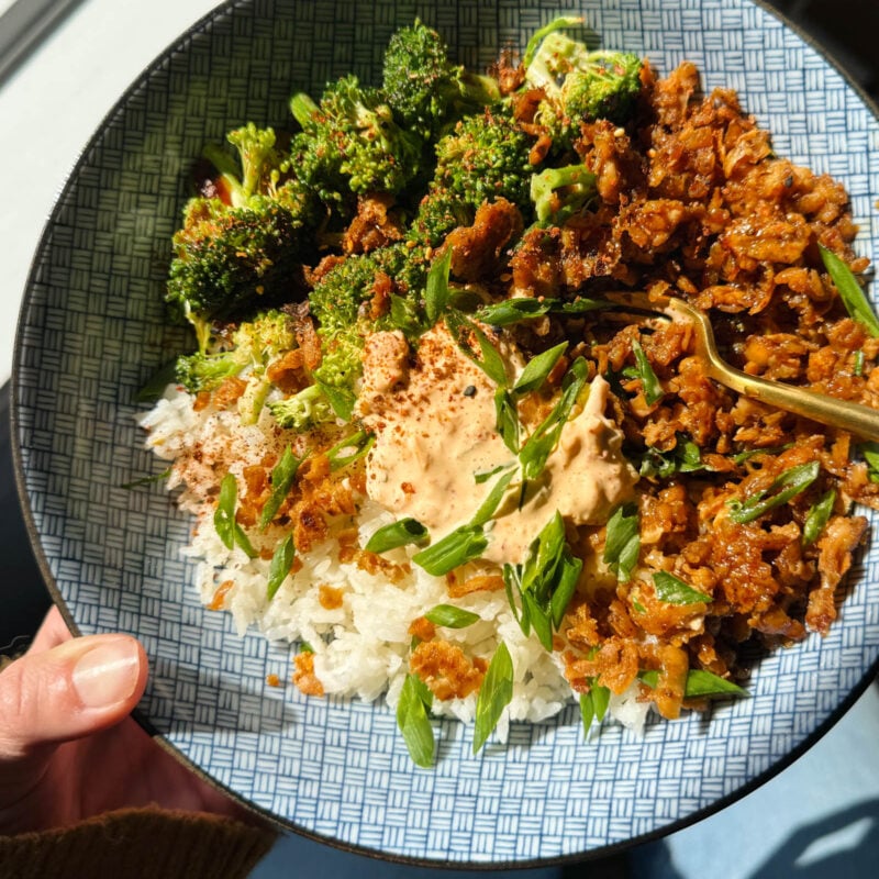 Teriyaki tofu bowls in a bowl with rice, broccoli, and kimchi mayo.